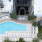 aerial of pool showing near tropical landscaping