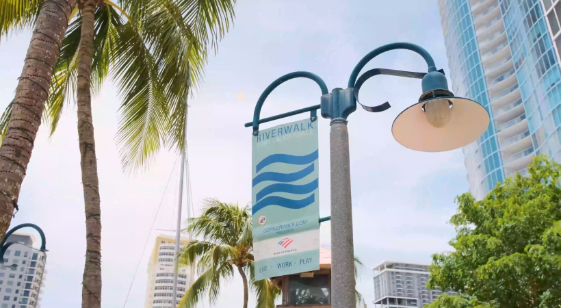 signage at the nearby riverwalk and park area