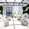 rendering of spacious lounge with seating and city views