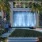 Large outdoor garden with a waterfall at The Registry Las Olas