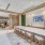 long countertop with seating at well lit coffee station