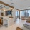 kitchen area in sky lounge surrounded by city views